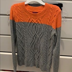 Grey and orange sweater